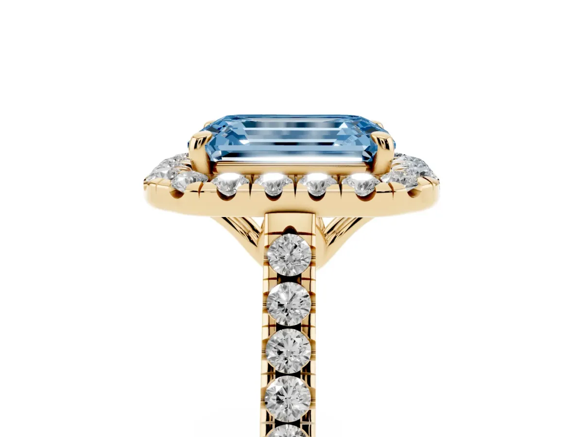 Fancy Blue Emerald Cut Halo Pavé Diamond Engagement Ring with Four-Prong Setting Yellow gold