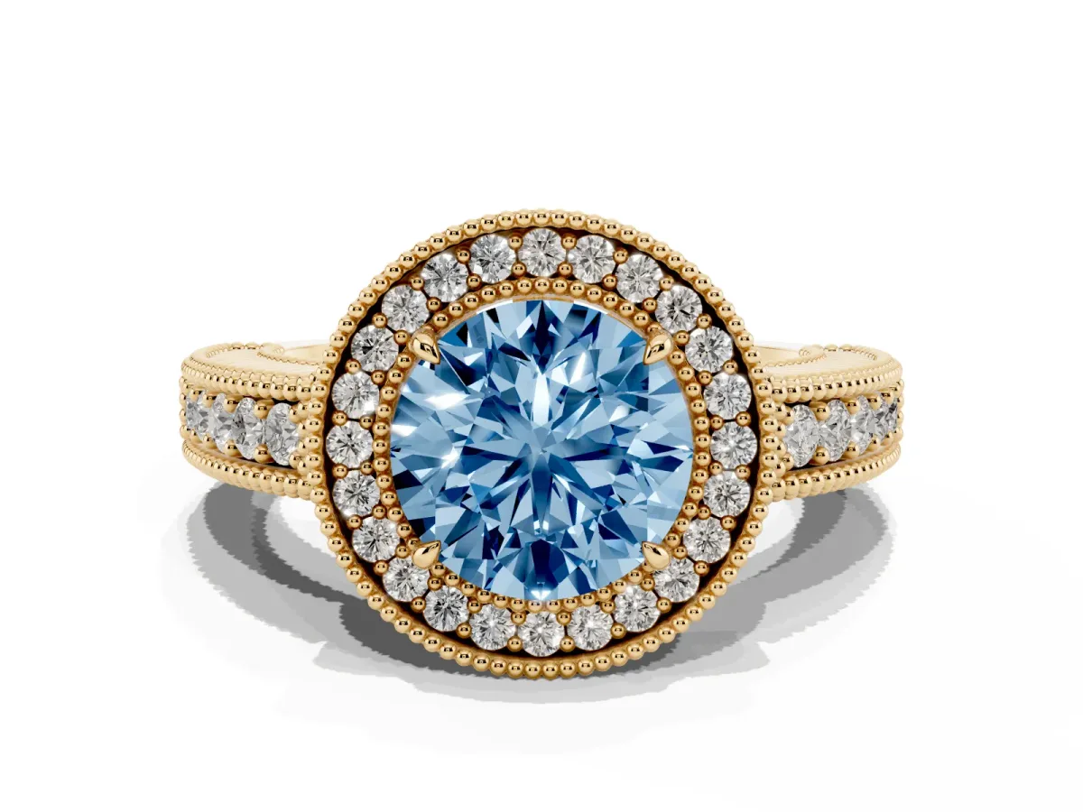 Fancy Blue Round Cut Cut Halo Diamond Ring with Pavé Band and Four-Prong Setting Yellow gold