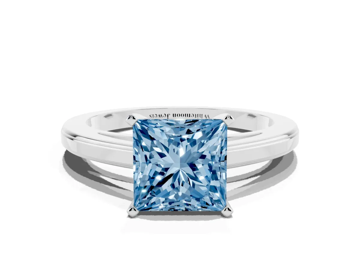 Fancy Blue Princess Cut Solitaire Diamond Ring with Four-Prong Setting and Classic Band Platinum