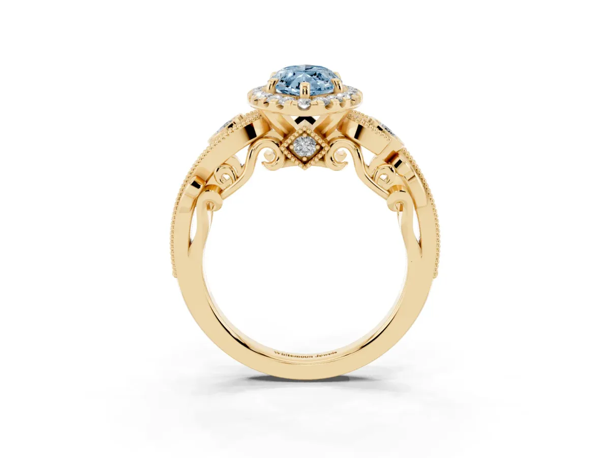 Fancy Blue Marquise Cut Halo Diamond Ring with Milgrain and Bezel Accents on a Split Shank Band Yellow gold