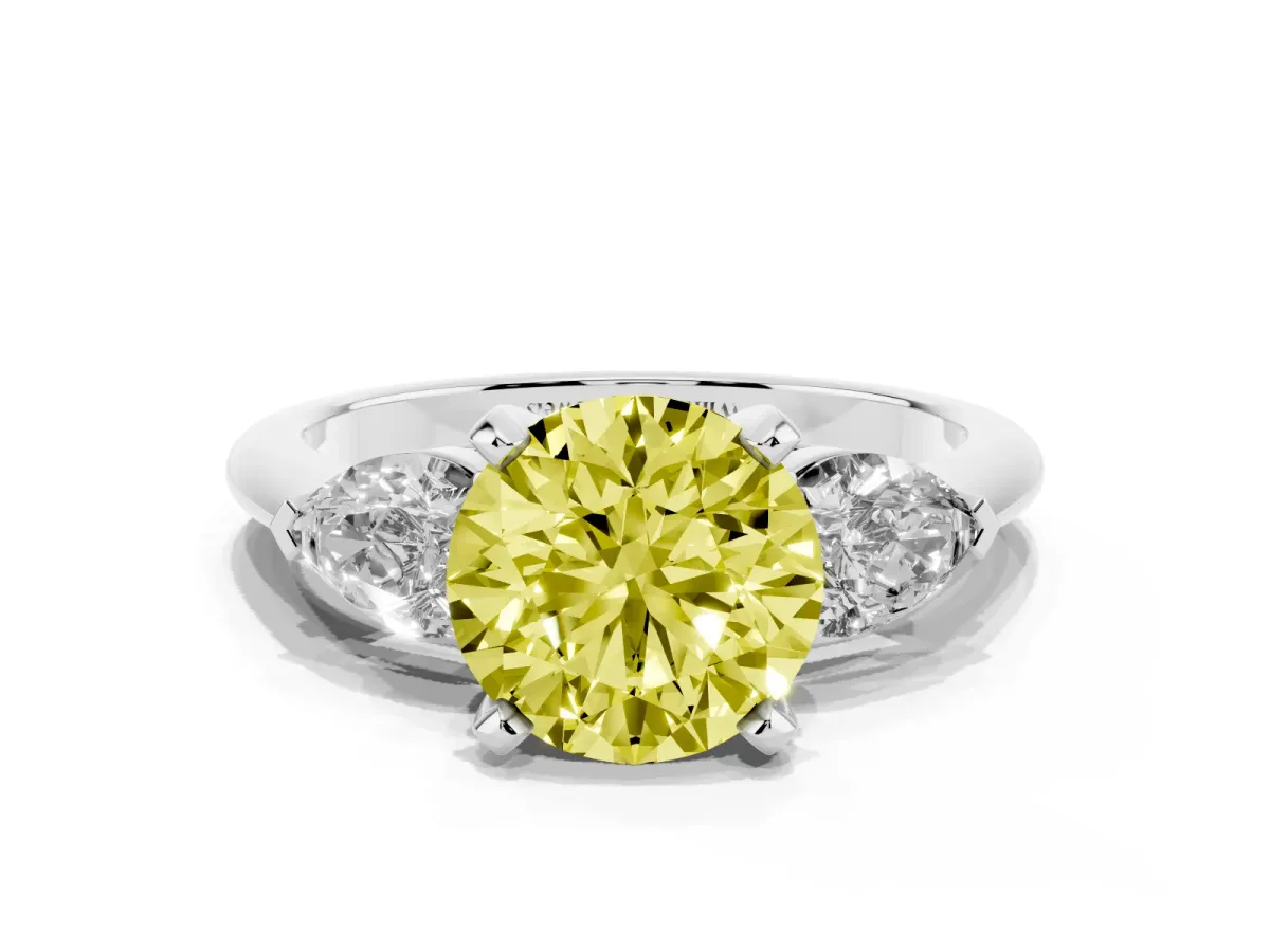 Fancy Yellow Three-Stone Round Cut Diamond Ring with Pear Side Stones and Four-Prong Setting Platinum