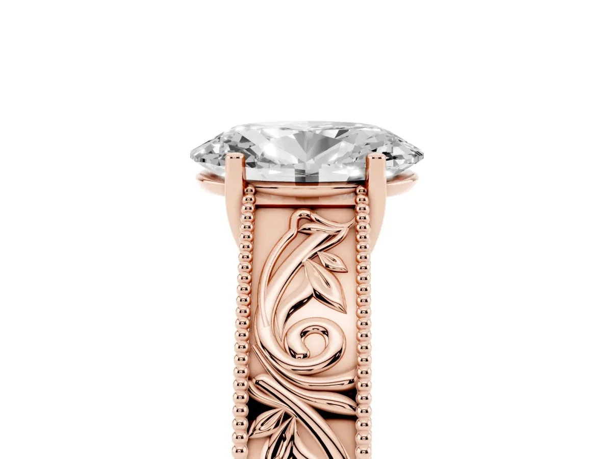 Oval Cut Diamond Solitaire Ring with Engraved Band and Four-Prong Setting Rose gold
