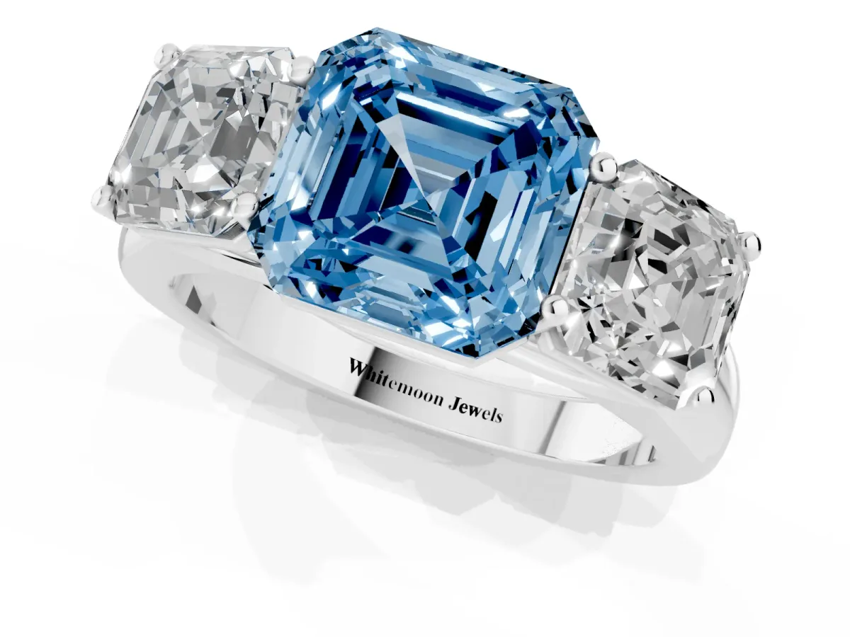 Fancy Blue Asscher Cut Three-Stone Diamond Ring with Prong Setting on a Classic Band White gold