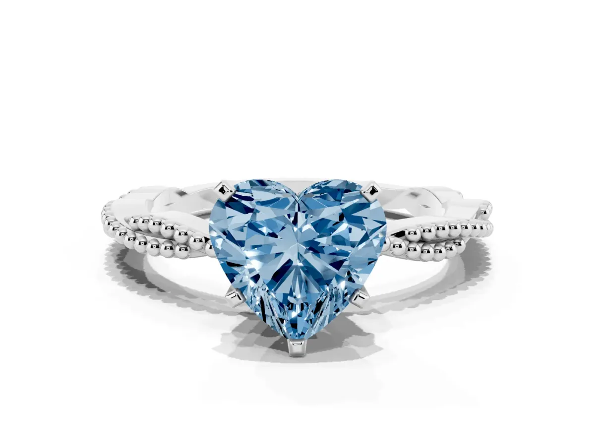 Fancy Blue Heart Cut Solitaire Twisted Band with Bead Prong Setting Platinum
