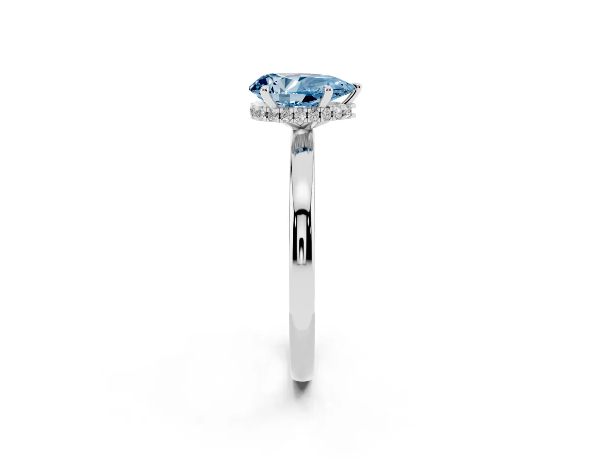 Fancy Blue Pear Cut Solitaire Engagement Ring with Cathedral Band and Four-Prong Setting White gold