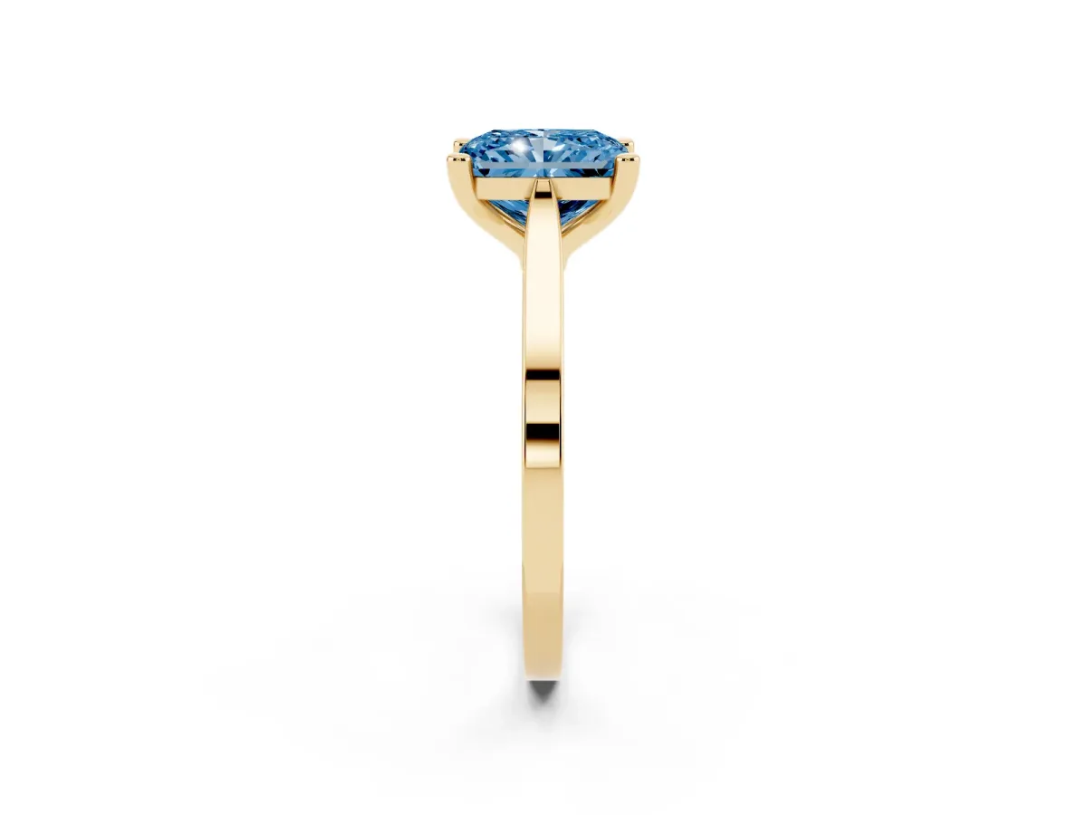 Fancy Blue Radiant Cut Solitaire Diamond Ring with Four-Prong Setting and Tapered Band Yellow gold