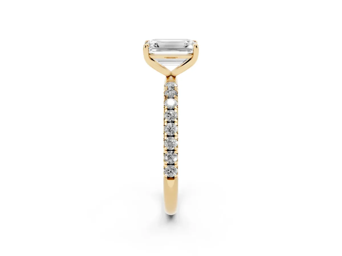 Emerald Cut Cut Diamond Solitaire Ring with Micro Pave Band and Four Prong Setting Yellow gold