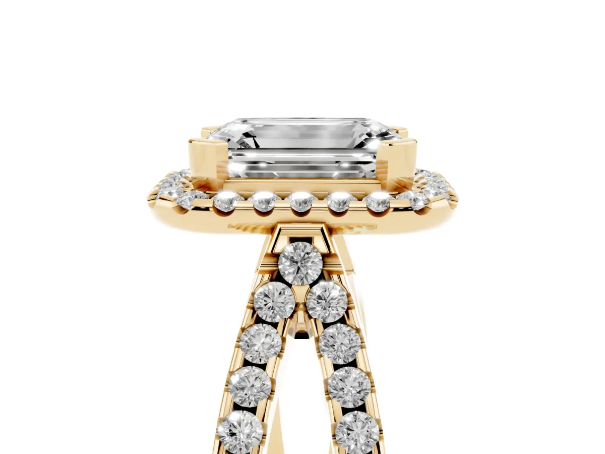 Emerald Cut Diamond Halo Ring with Split Shank Pavé Band and Prong Setting Yellow gold