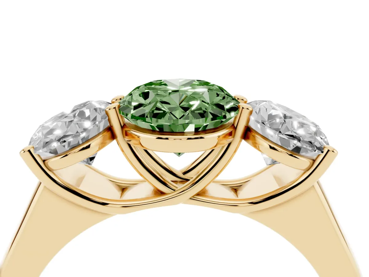 Fancy Green Oval Cut Three-Stone Diamond Ring with Prong Setting on a Classic Band Yellow gold