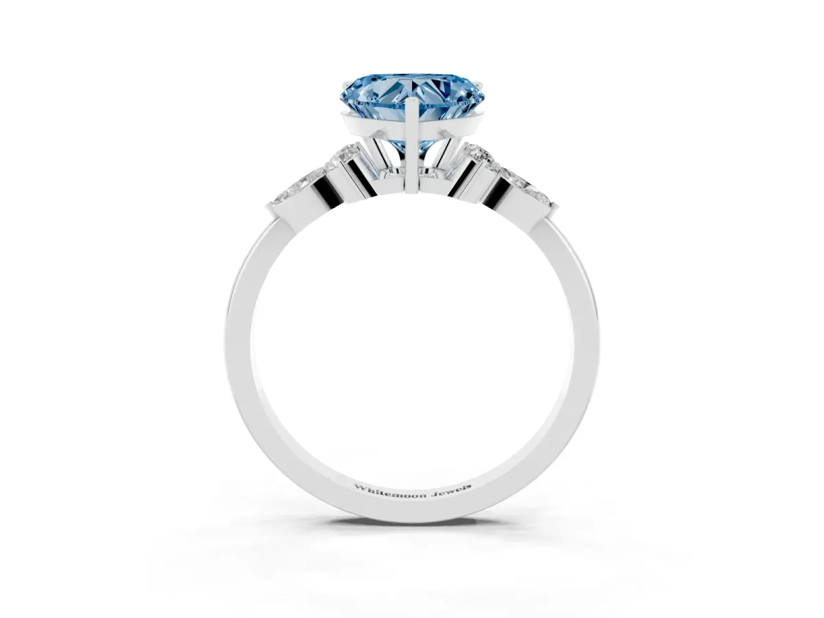 Fancy Blue Heart Cut Brilliant Diamond Solitaire Ring with Pear Side Stones and Four-Prong Setting Silver