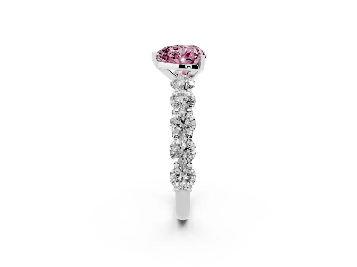 Fancy Pink Heart Cut Diamond Prong Setting with Side Stones on a Pave Band Silver