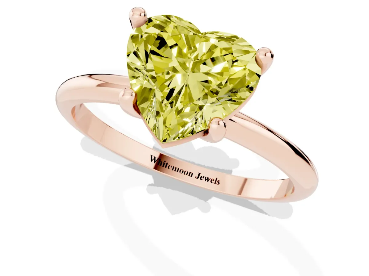 Fancy Yellow Heart Cut Solitaire Diamond Ring with 4-Prong Setting on a Classic Band Rose gold