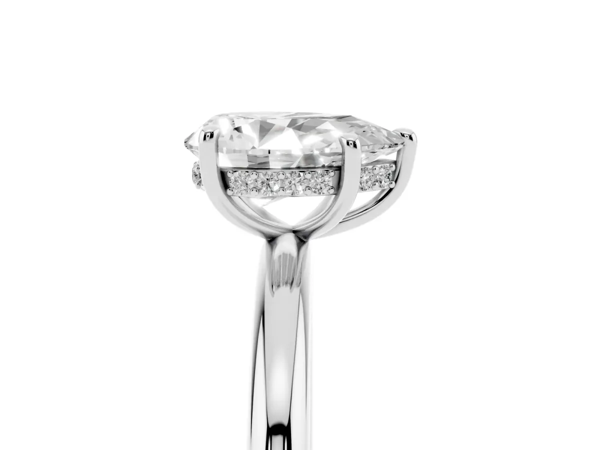 Pear Cut Diamond Solitaire Ring with Thin Band and Four-Prong Setting Silver