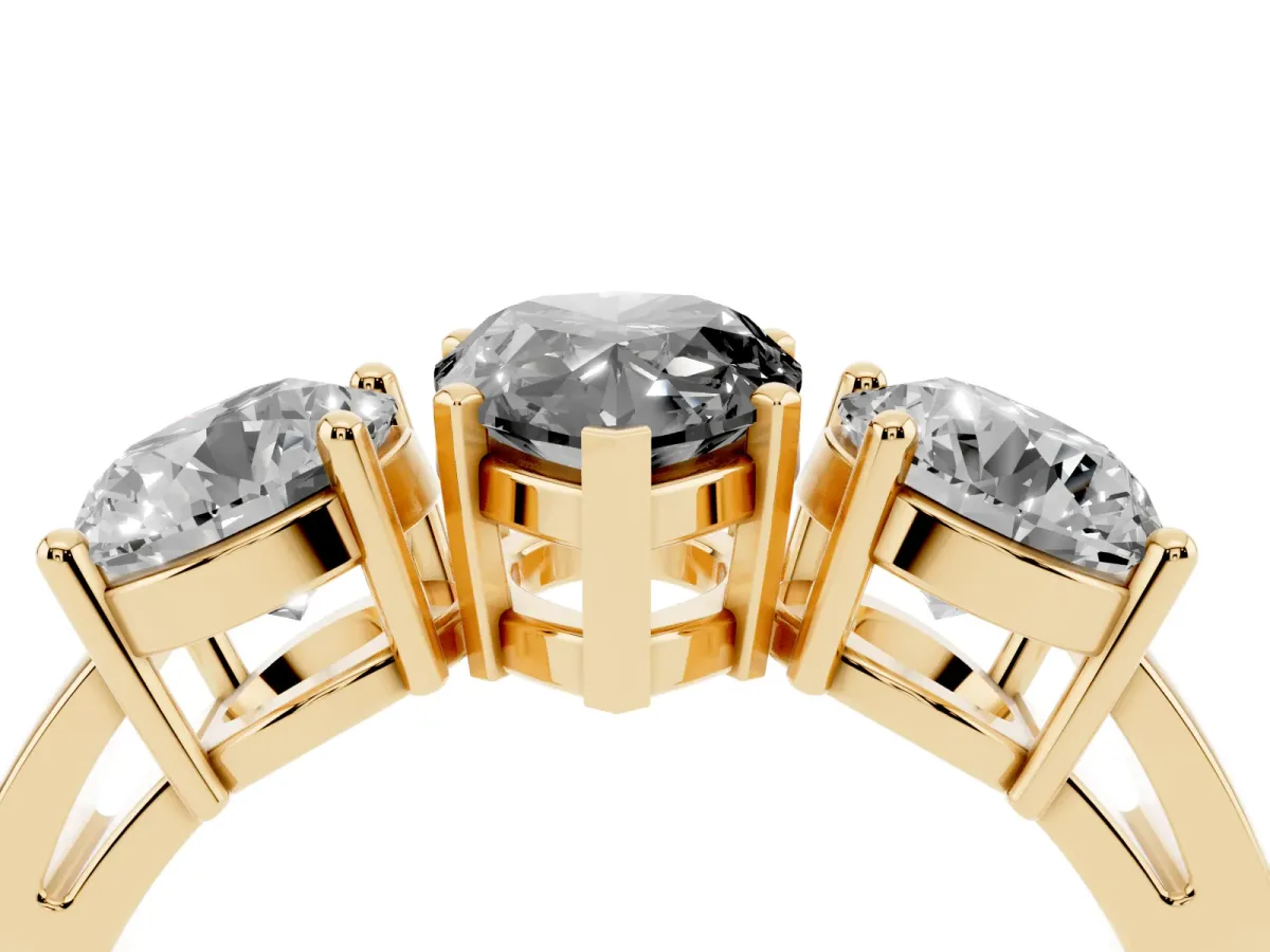 Fancy Black Three-Stone Pear Cut Diamond Ring with Round Side Stones, Classic Band, and Four-Prong Setting Yellow gold