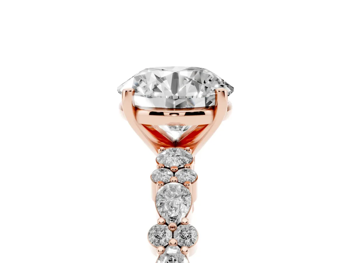 Round Cut Diamond Side Stone Solitaire Ring with Round and Four-Prong Setting Rose gold