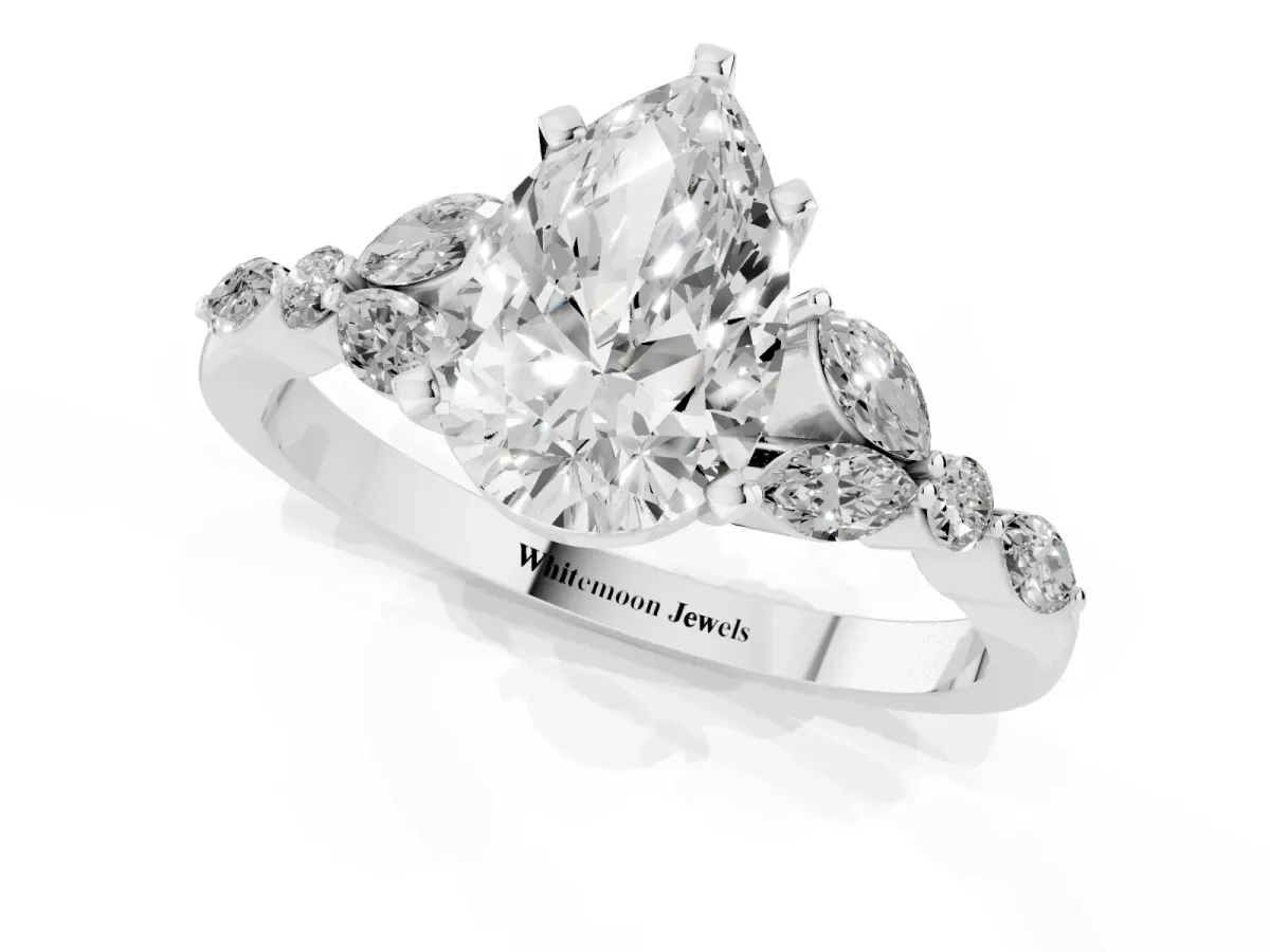 Pear Cut Diamond Solitaire Ring with Side Stones and Four-Prong Setting Silver