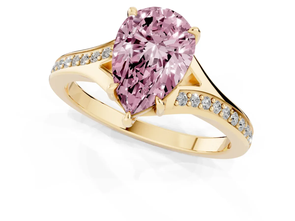 Fancy Pink Pear Cut Diamond Solitaire Ring with Pavé Band and Prong Setting Yellow gold
