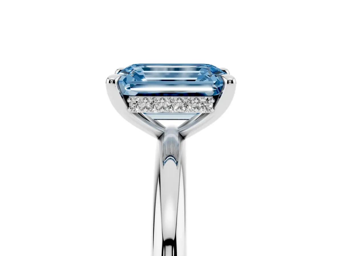 Fancy Blue Emerald Cut Diamond Solitaire Ring with Thin Band and Four-Prong Setting Silver