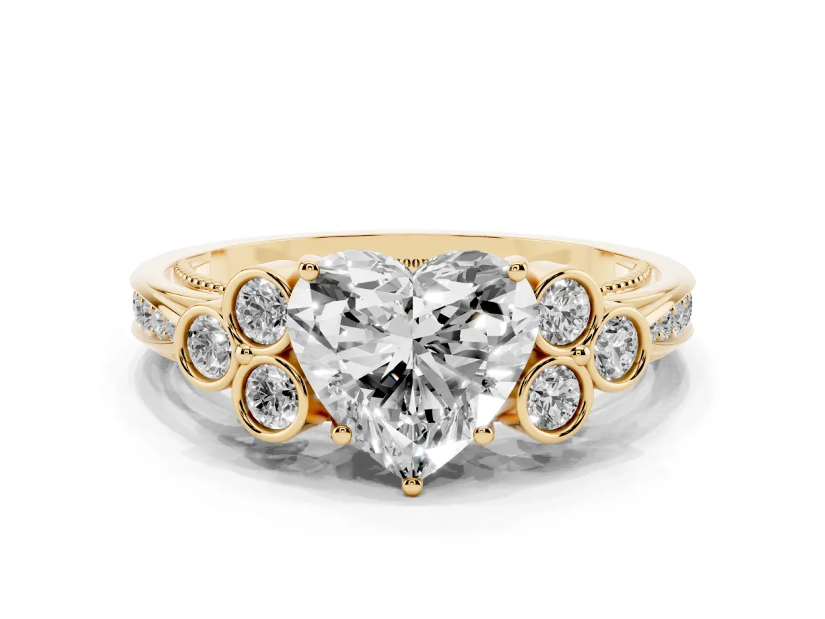Heart Cut Cut Diamond Engagement Ring with Bezel Set Round Side Stones and Prong Setting Yellow gold