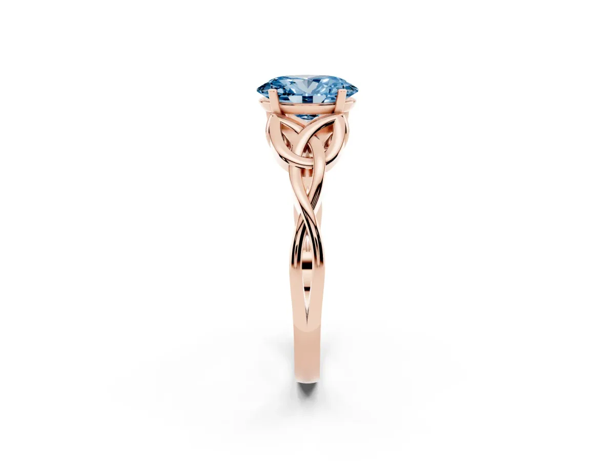 Fancy Blue Oval Cut Diamond Solitaire Engagement Ring with Celtic Knot Band and Four-Prong Setting Rose gold
