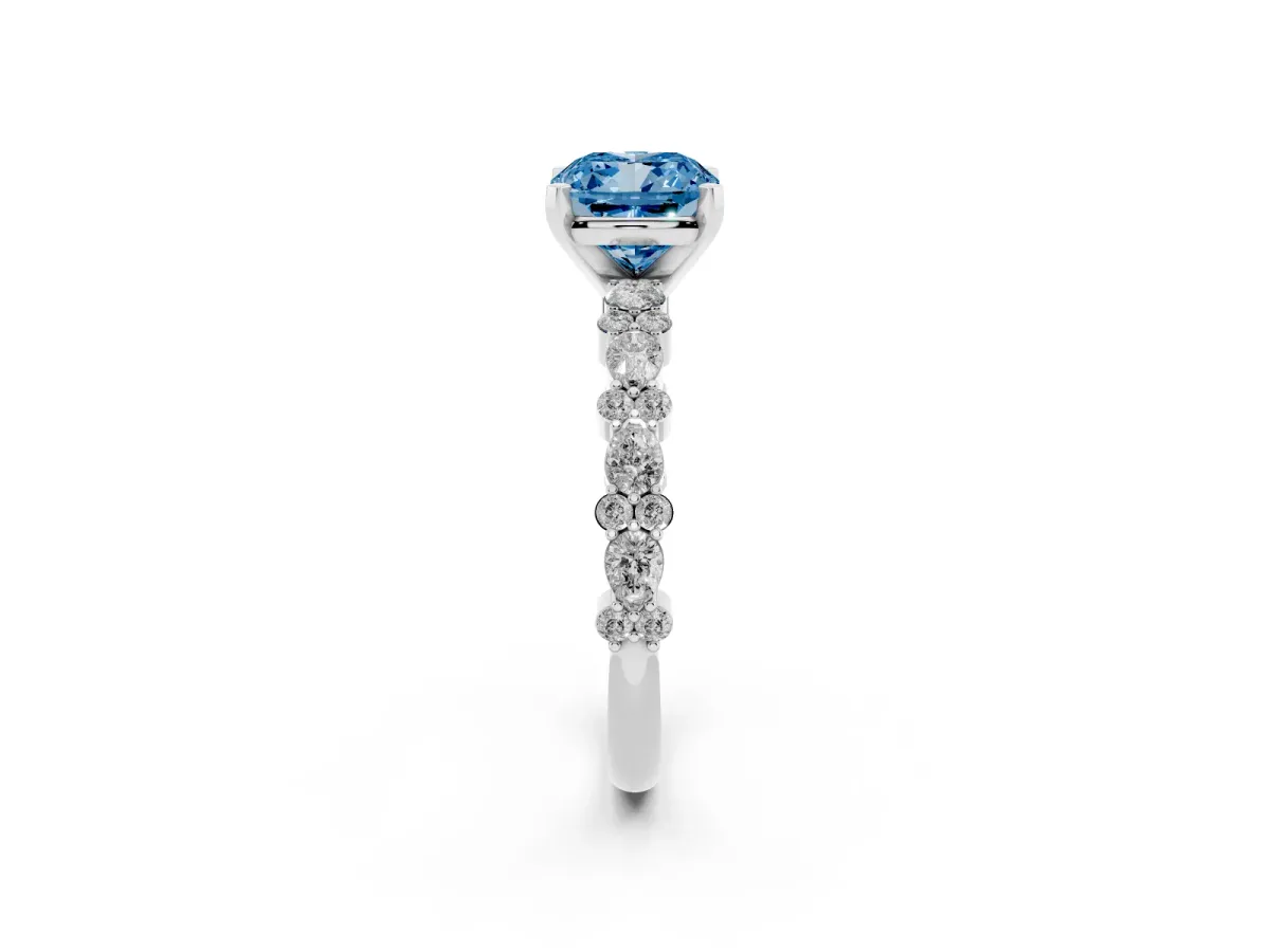 Fancy Blue Cushion Cut Diamond Side Stone Solitaire Ring with Round and Four-Prong Setting Platinum