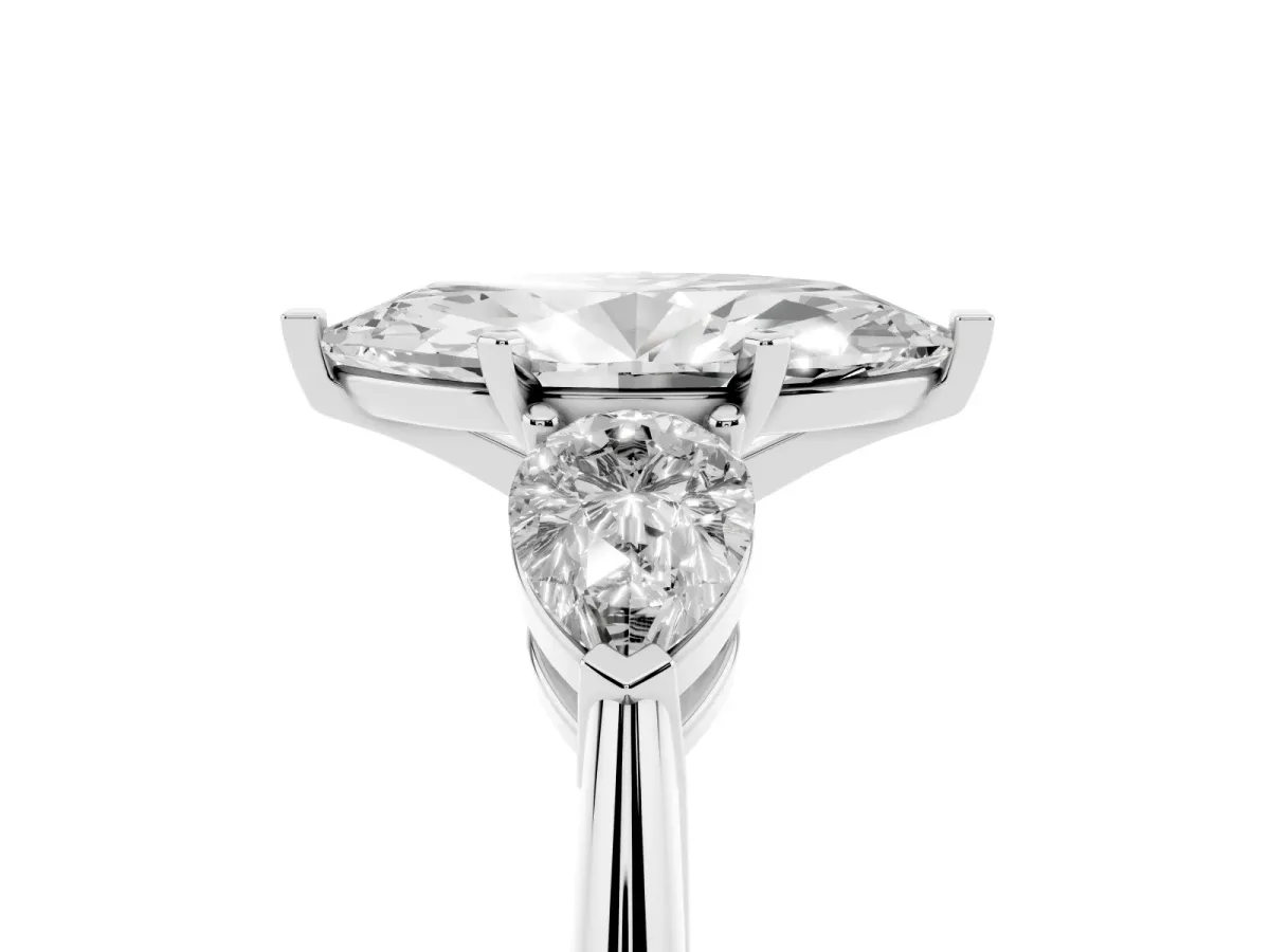 Three-Stone Marquise Cut Diamond Ring with Pear Side Stones and Four-Prong Setting Silver