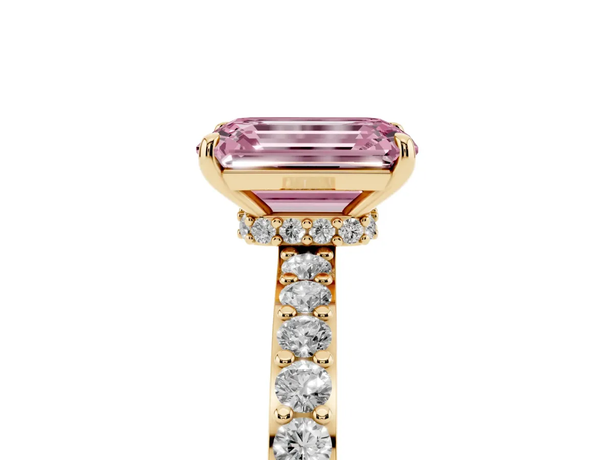 Fancy Pink Emerald Cut Diamond Pavé Engagement Ring with Round Accents and Prong Setting Yellow gold