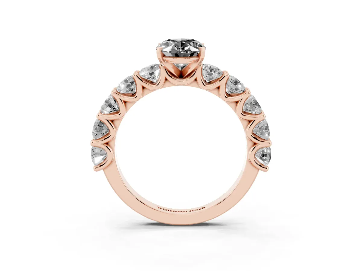 Fancy Black Oval Cut Diamond Prong Setting with Side Stones on a Pave Band Rose gold