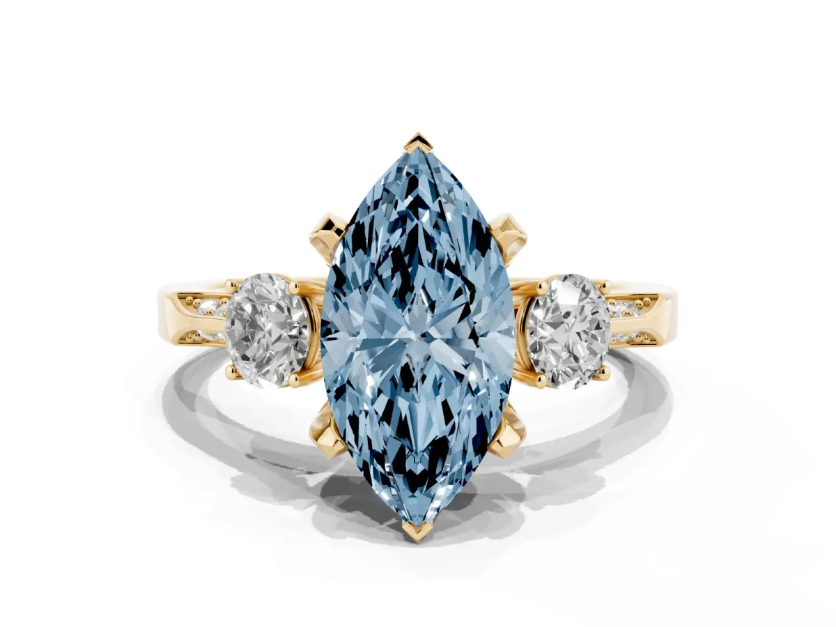 Fancy Blue Marquise Cut Brilliant Three-Stone Diamond Ring with Pavé Band and Four-Prong Setting Yellow gold