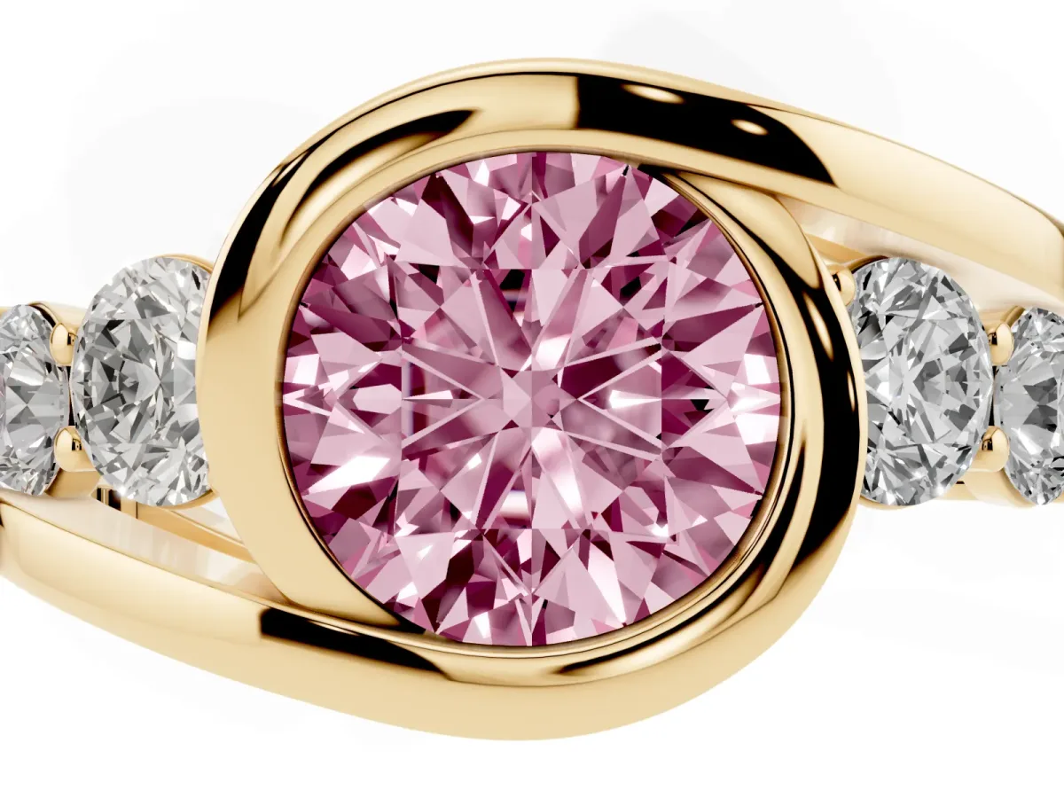 Fancy Pink Bezel Set Round Cut Diamond Bypass Ring with Round Accents Yellow gold