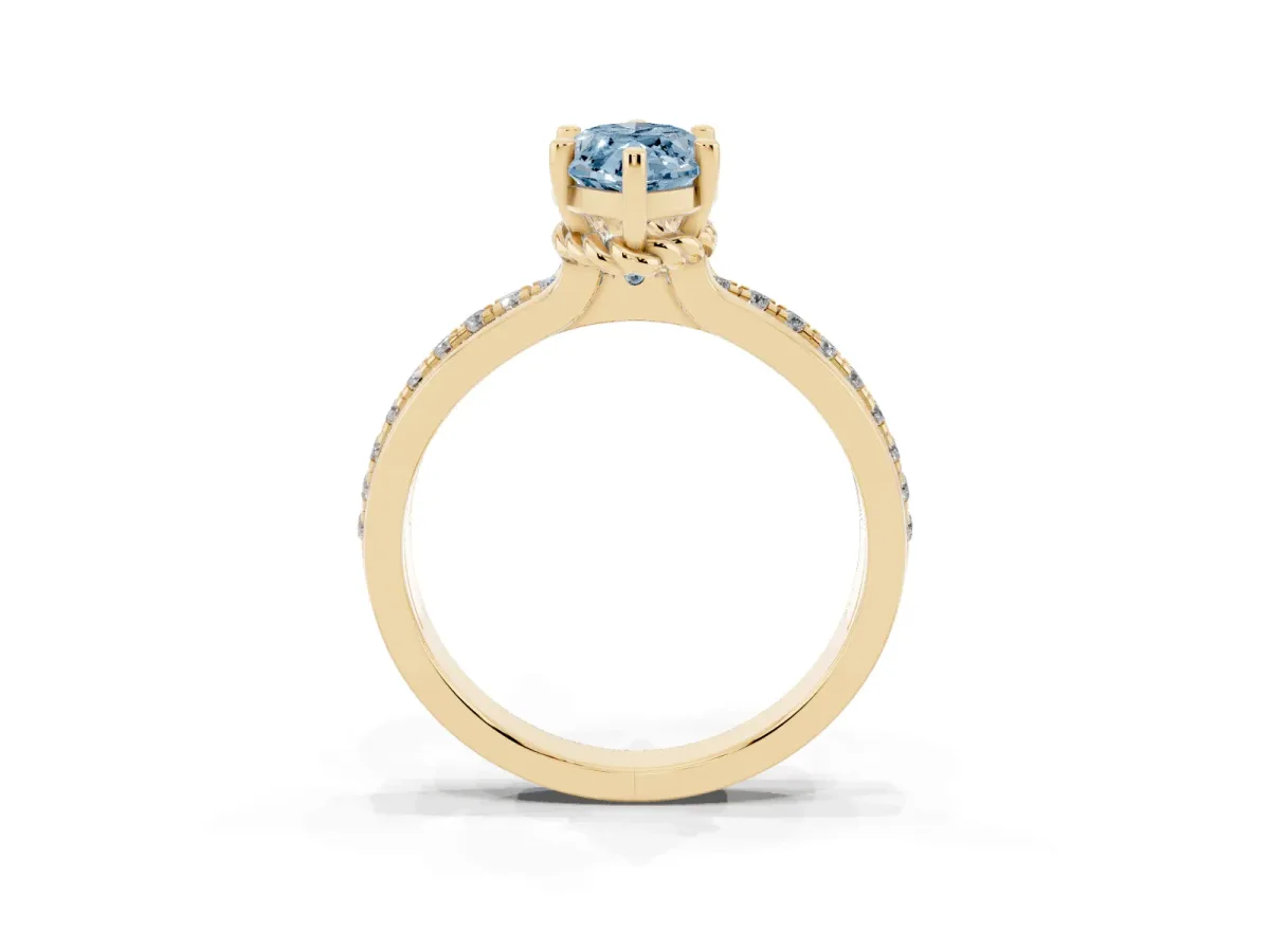 Fancy Blue Marquise Cut Solitaire Diamond Ring with Channel Set Band and Six-Prong Setting Yellow gold