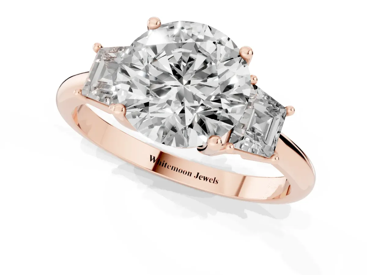 Round Cut Diamond Three-Stone Ring with Trapezoid Side Stones and Prong Setting Rose gold