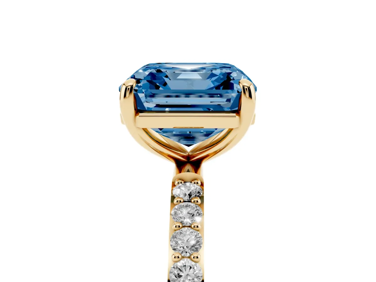 Fancy Blue Asscher Cut Diamond Solitaire Ring with Round Pavé Band and Prong Setting Yellow gold