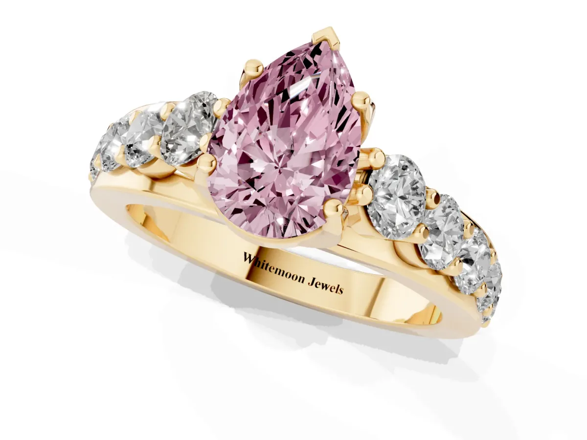 Fancy Pink Pear Cut Diamond Engagement Ring with Pavé Band and Four-Prong Setting Yellow gold