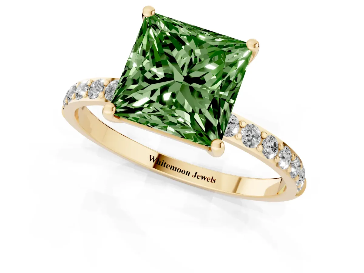 Fancy Green Princess Cut Diamond Solitaire Ring with Round Pavé Shoulders and Prong Setting Yellow gold
