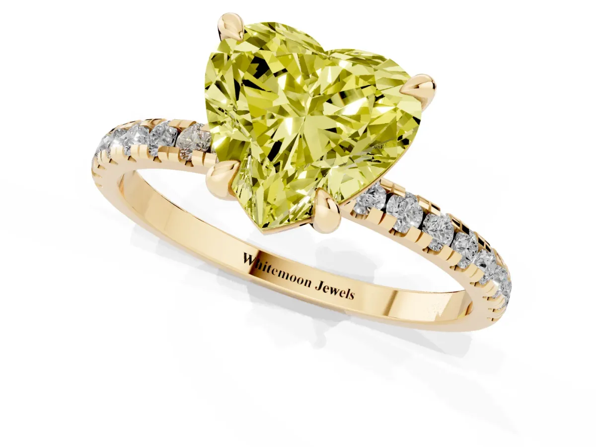 Fancy Yellow Heart Cut Diamond Brilliant Solitaire Ring with Pavé Band and Four-Prong Setting Yellow gold