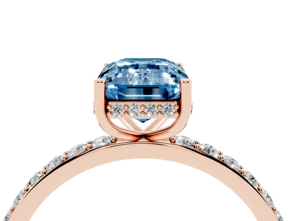Fancy Blue Emerald Cut Diamond Solitaire Ring with Pavé Band and Hidden Halo Rose gold