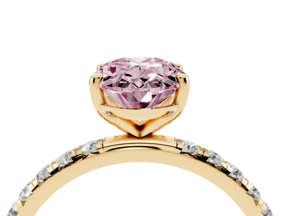 Fancy Pink Oval Cut Cut Diamond Solitaire Ring with Micro Pave Band and Four Prong Setting Yellow gold