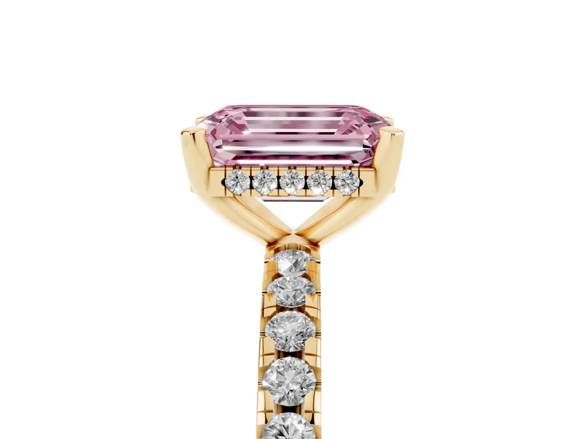 Fancy Pink Emerald Cut Diamond Solitaire Ring with Round Pavé Band and Four-Prong Setting Yellow gold