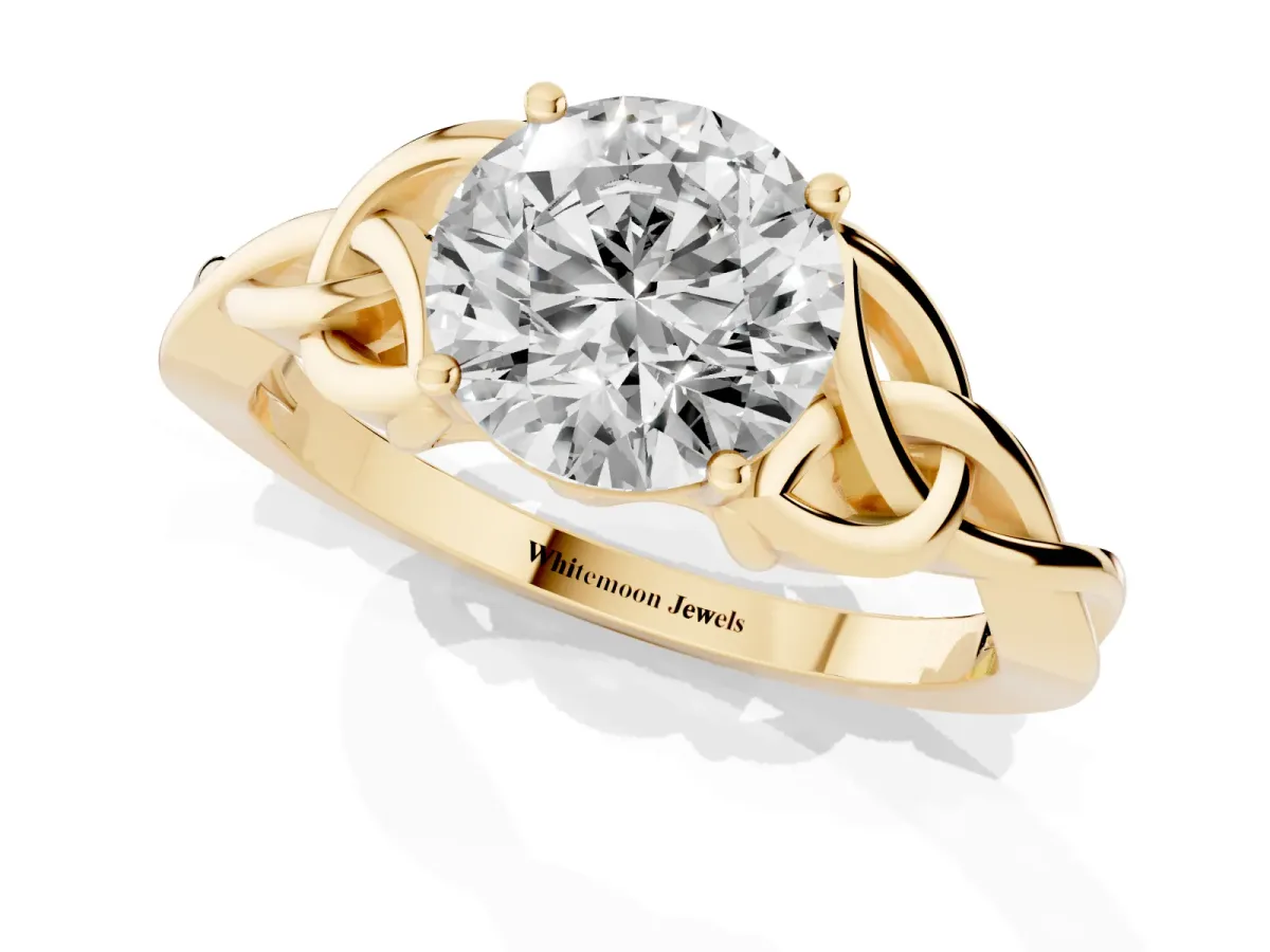 Round Cut Diamond Solitaire Engagement Ring with Celtic Knot Band and Four-Prong Setting Yellow gold
