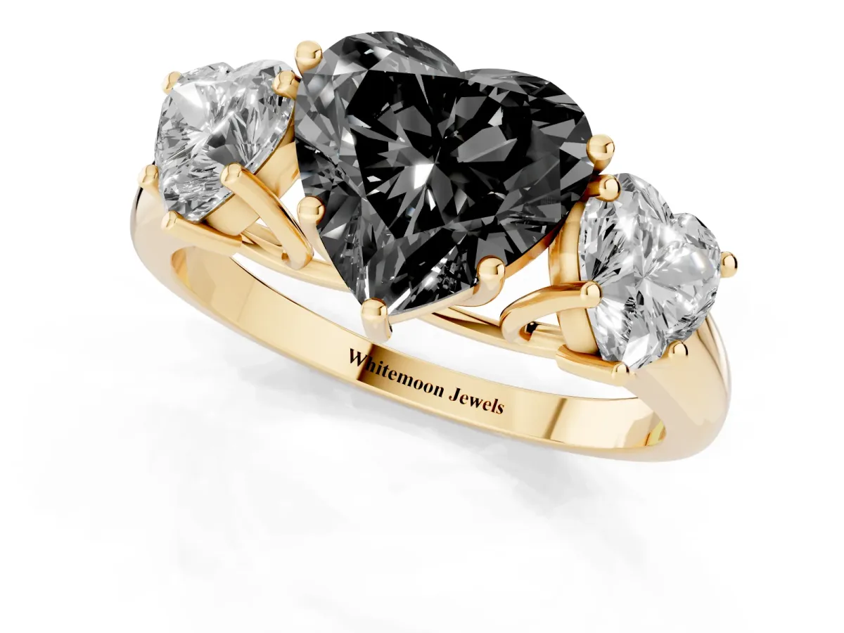 Fancy Black Three-Stone Heart Cut Diamond Engagement Ring with Prong Setting Yellow gold
