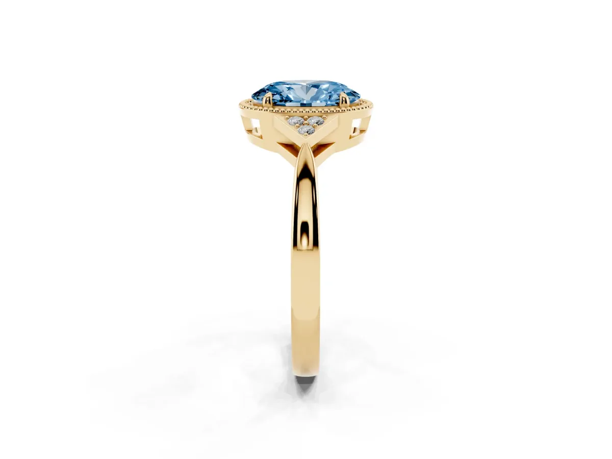 Fancy Blue Oval Cut Diamond Halo Ring with Tapered Band and Four-Prong Setting Yellow gold