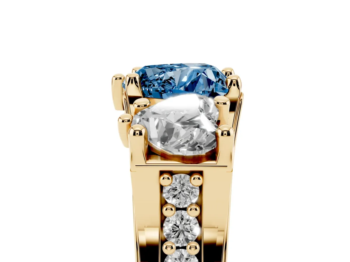 Fancy Blue Heart Cut Diamond Three-Stone Ring with Channel Set Band and Four-Prong Setting Yellow gold