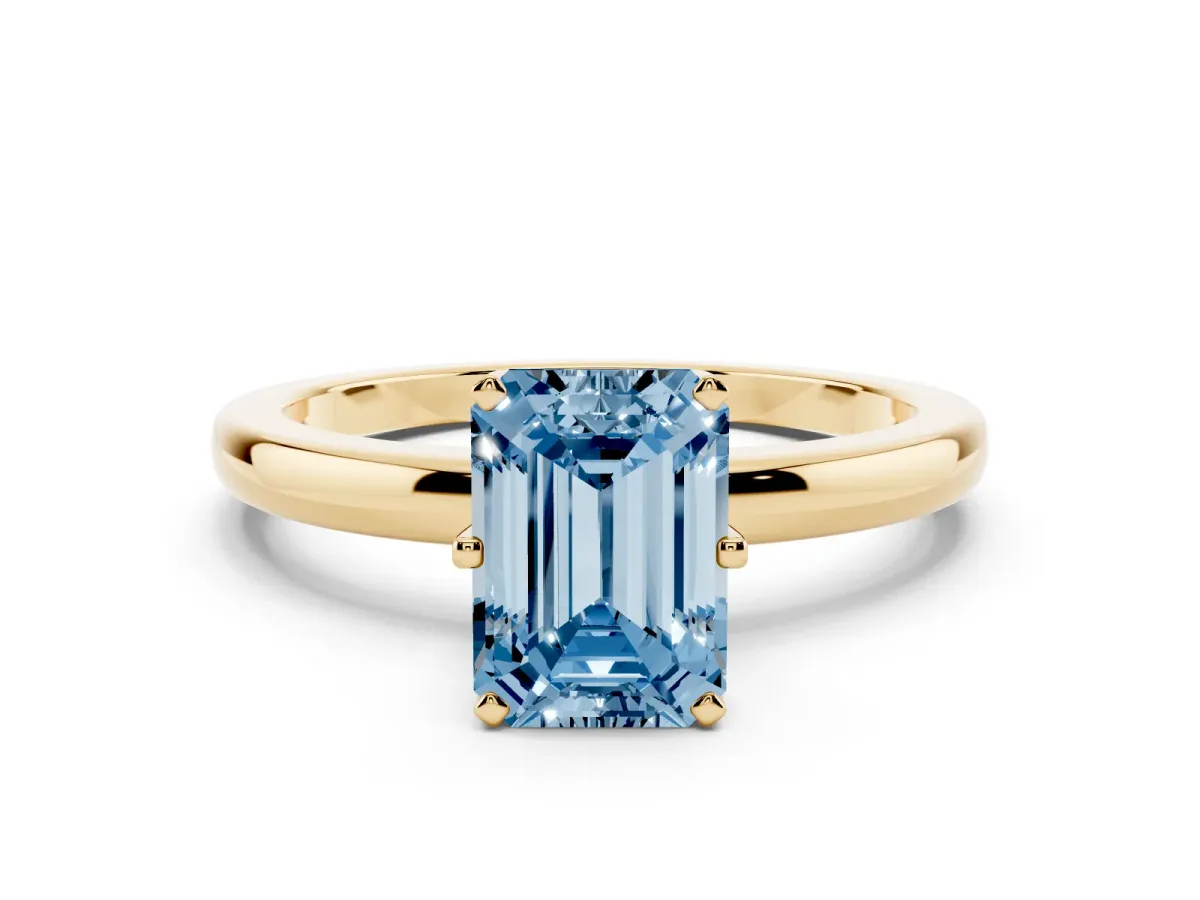 Fancy Blue Emerald Cut Solitaire Diamond Ring with Six-Prong Setting on a Classic Band Yellow gold