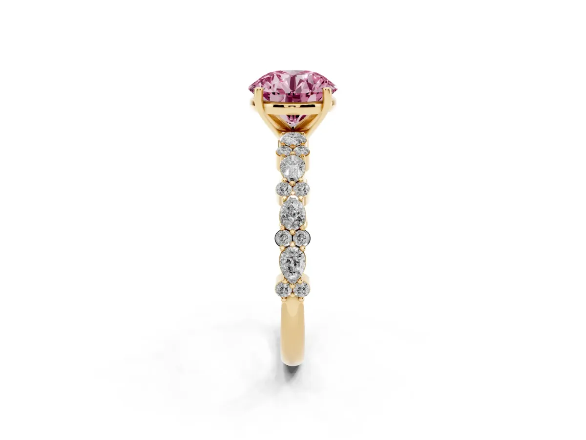 Fancy Pink Round Cut Diamond Side Stone Solitaire Ring with Round and Four-Prong Setting Yellow gold