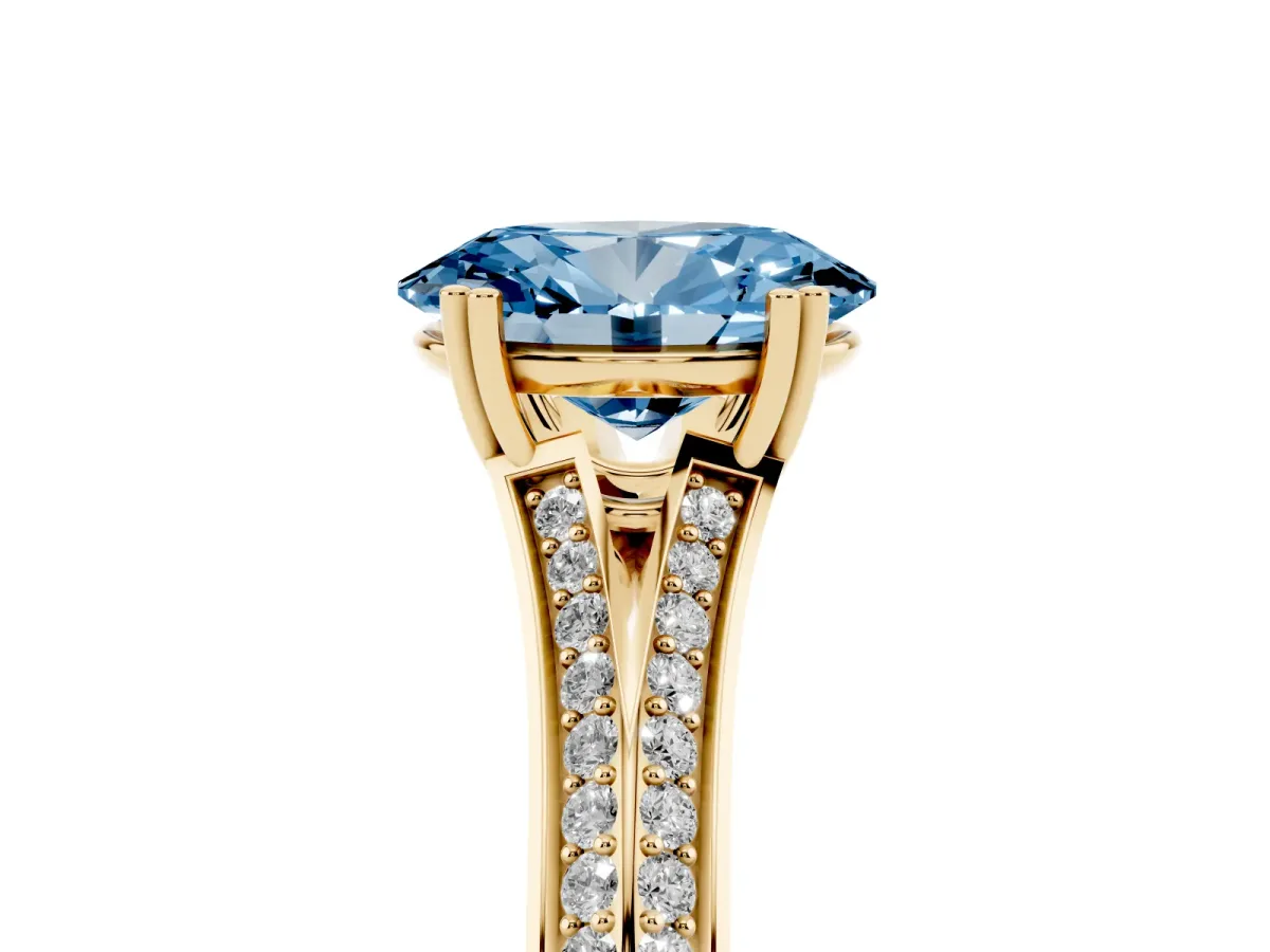 Fancy Blue Oval Cut Diamond Split Shank Engagement Ring with Pavé Band Yellow gold