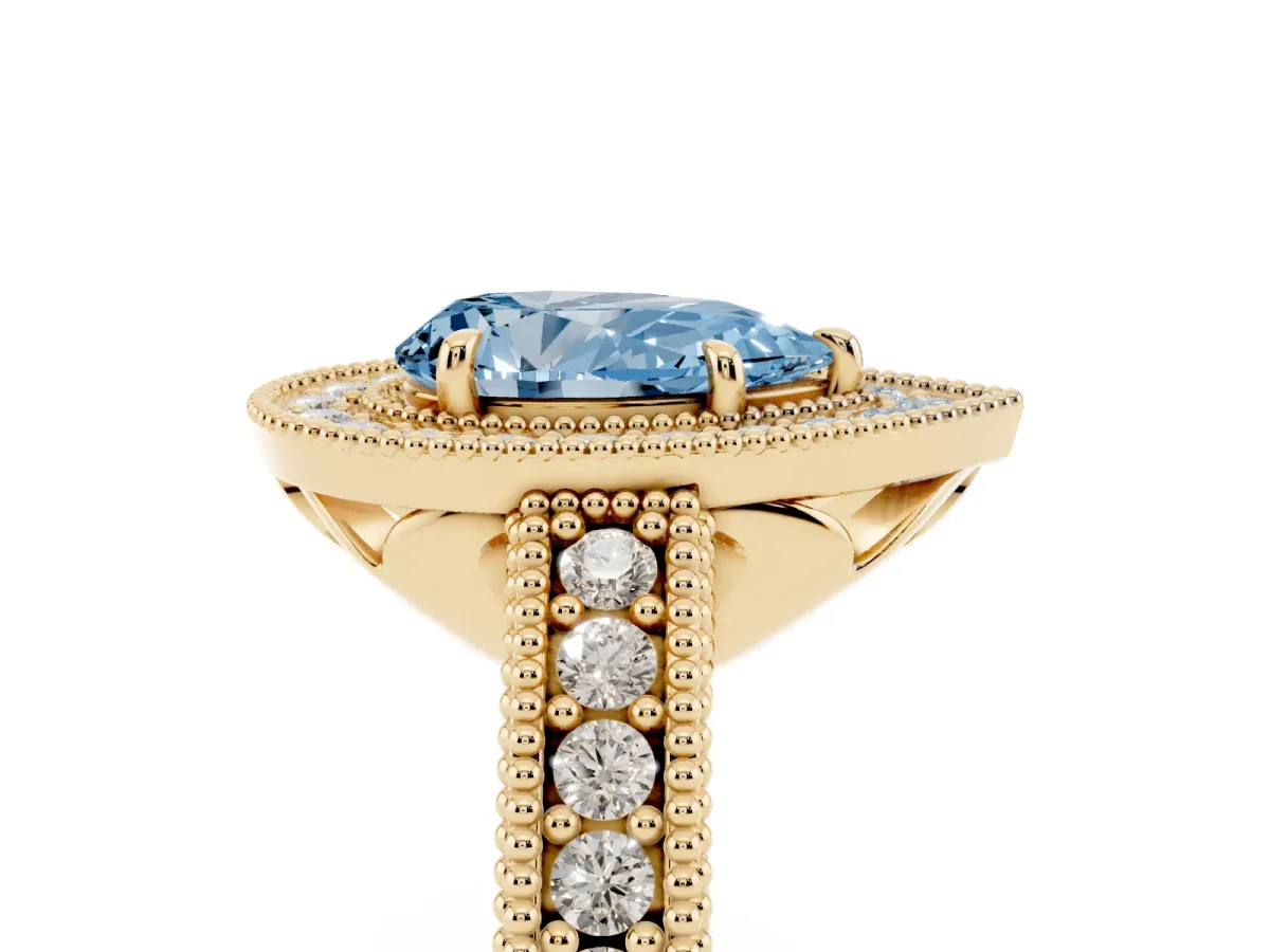 Fancy Blue Pear Cut Cut Halo Diamond Ring with Pavé Band and Four-Prong Setting Yellow gold