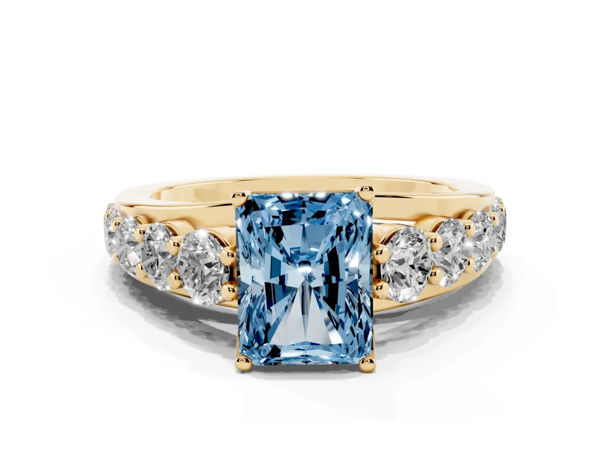 Fancy Blue Radiant Cut Diamond Engagement Ring with Pavé Band and Four-Prong Setting Yellow gold