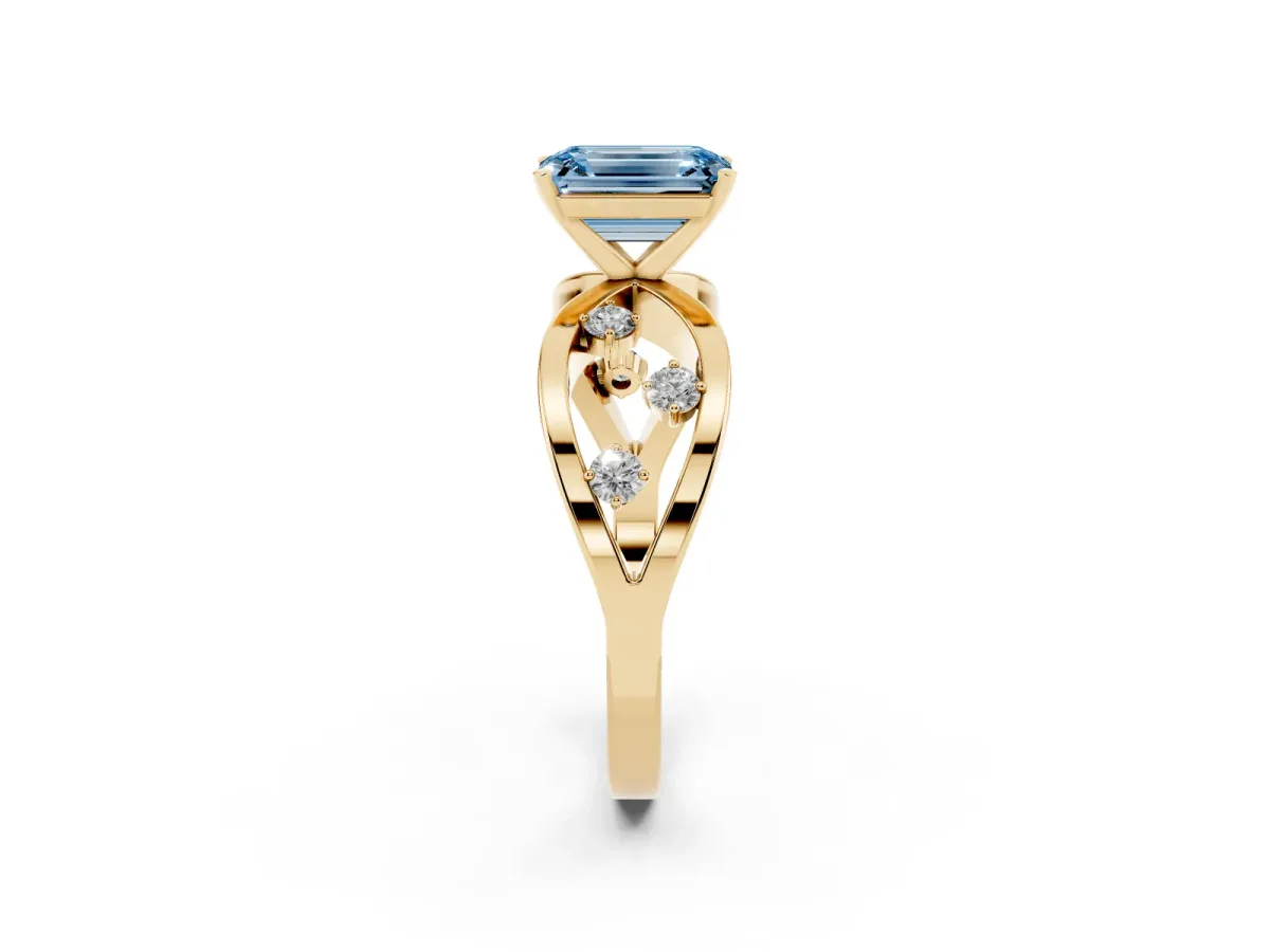 Fancy Blue Emerald Cut Cut Solitaire Diamond with Side Stones on Criss-Cross Band and Four-Prong Setting Yellow gold