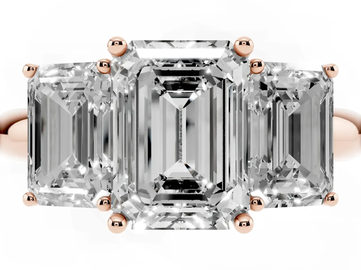 Three-Stone Emerald Cut Cut Diamond Engagement Ring with Prong Setting on a White Gold Band Rose gold